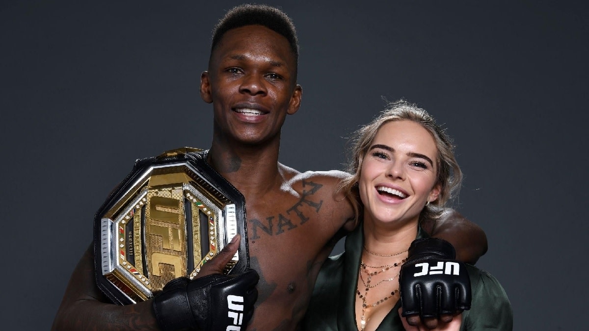 Israel Adesanya poses with his ex-girlfriend