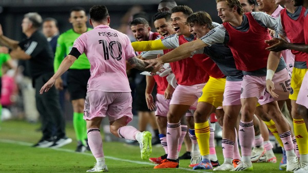 Lionel Messi celebrating with Inter Miami teammates.