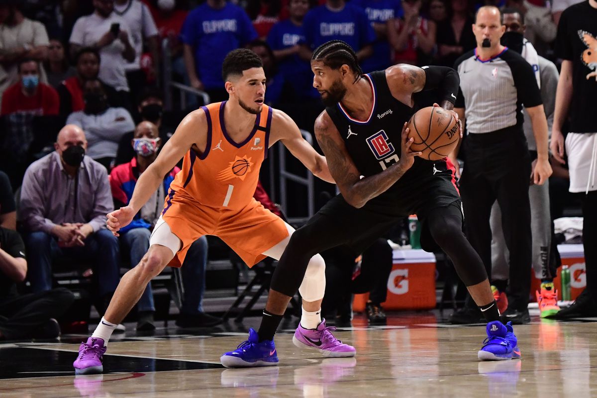 Paul George and Devin Booker