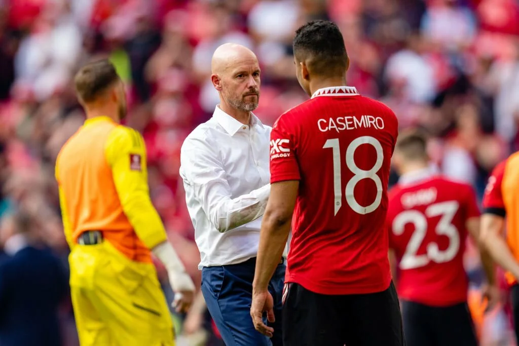 Erik ten Hag interacts with Casemiro