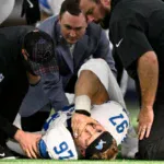 Broken Tibia Sidelines Lions Star Aidan Hutchinson for Rest of NFL Season