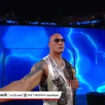 The Meaning Behind The Rock’s Cryptic Gesture At WWE Bad Blood