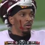 The Internet Can't Stop Talking About Jayden Daniels' Bloodied Face in Wild Card Win